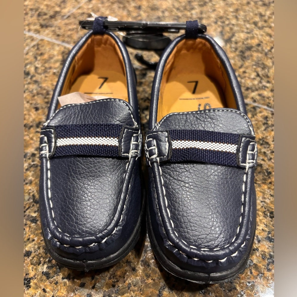 Shoe Shox Navy Blue Loafers with White Stripe, size 7.